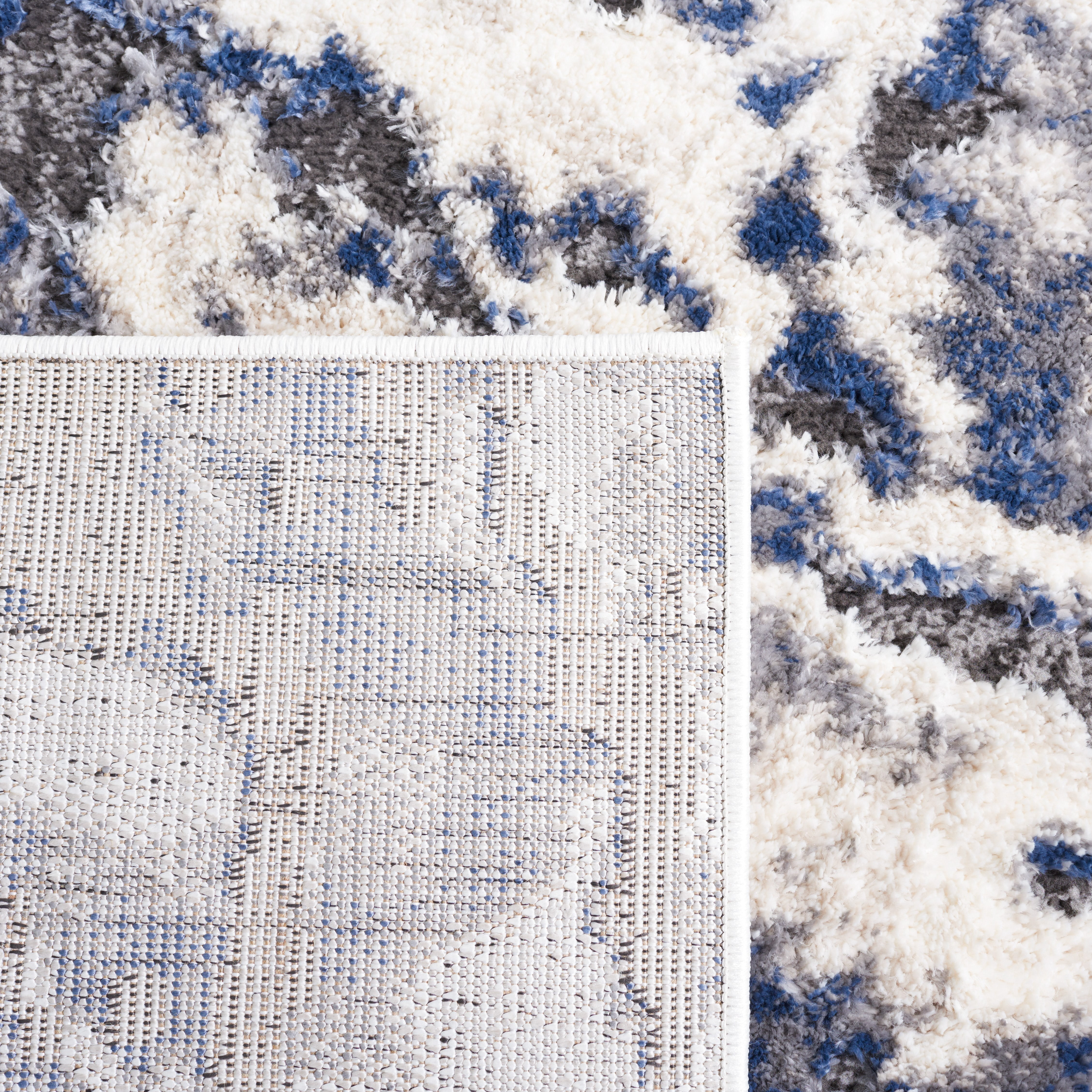 SAFAVIEH Petra Carmella Abstract Area Rug, Ivory/Blue, 8' x 10'