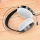 thumbnail image 2 of Funda desechable de repuesto para auriculares, 100 unidades por bolsa, de tela no tejida, para auriculares de 10-12 cm., 2 of 5