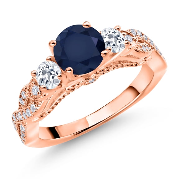 Gem Stone King 18K Rose Gold Plated Silver Blue Sapphire White Topaz and White Moissanite Engagement Ring for Women (1.65 Cttw, Gemstone September Birthstone, Round 6MM and 3MM, Size 9)