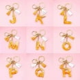 thumbnail image 2 of Golden Foil Orange Letter Keychain, 2 of 6