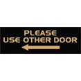 thumbnail image 1 of All Quality Please USE Other Door Sign - (Left Arrow) (Black/Gold) - Small 2" x 6", 1 of 1
