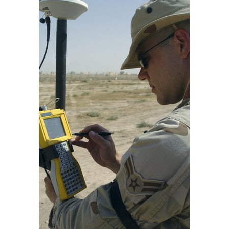 US Air Force engineer using global positioning system-based survey equipment Canvas Art - Stocktrek Images (23 x 35)