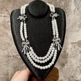 thumbnail image 4 of Layered Pearl Bow Necklace for Women, Multi Layer Choker with Heart Butterfly Cross Pendant, Vintage French Style Faux Pearl Chain Jewelry for Daily Wear Party Gift, 4 of 9