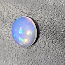 2.55 Carat Natural Blue Fire Ethiopian Opal Oval Cabochon Loose Gemstone