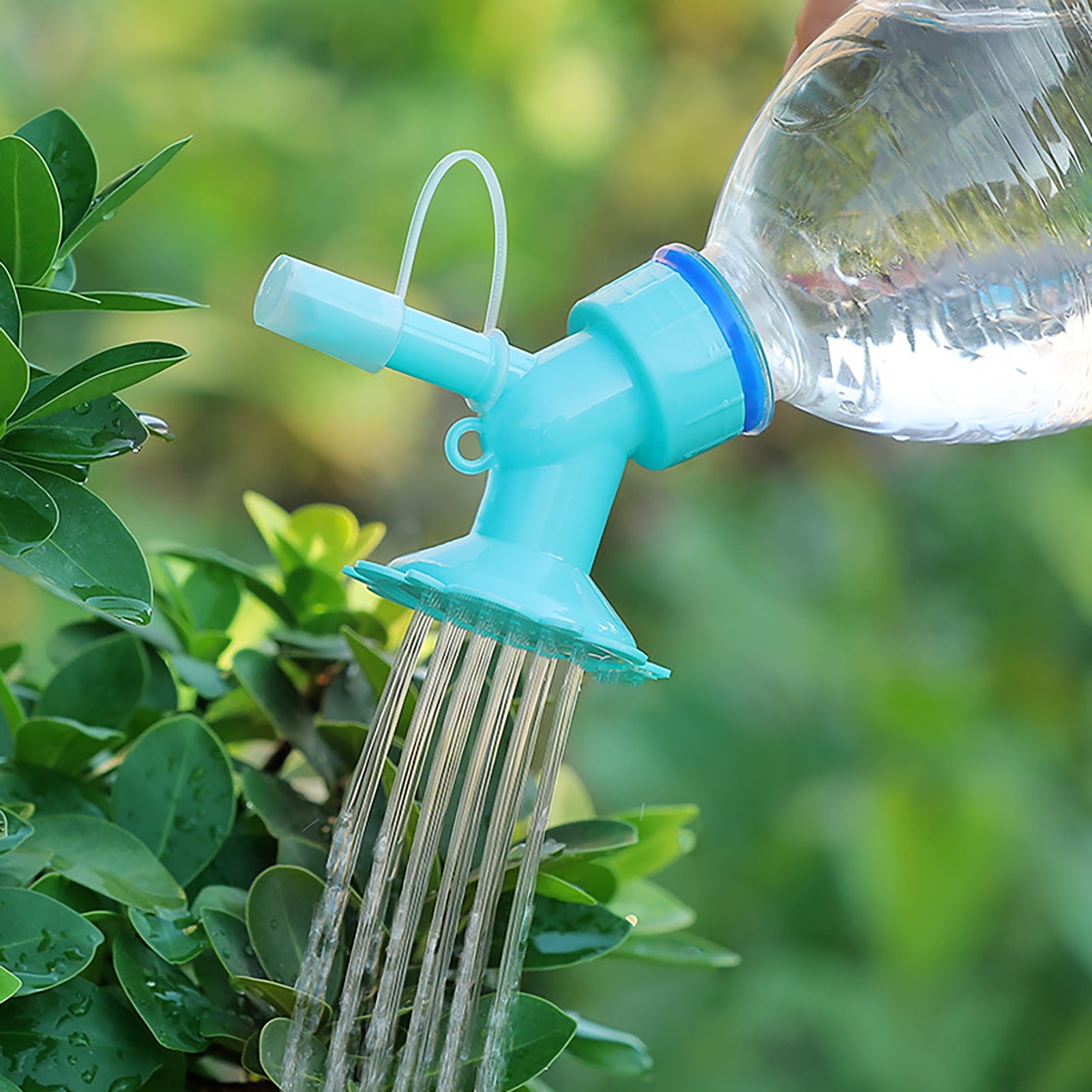 Portable Pourer Spout to Attach to Plastic Bottles for Watering plants.