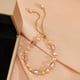 thumbnail image 5 of Pulsera francesa vintage de cristal de perlas moradas • Ajustable 15-30cm • Joyería elegante para mujeres, 5 of 8