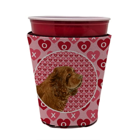 

Caroline s Treasures SS4510RSC Sussex Spaniel Hearts Love Valentine s Day Red Cup Hugger Red Cup multicolor