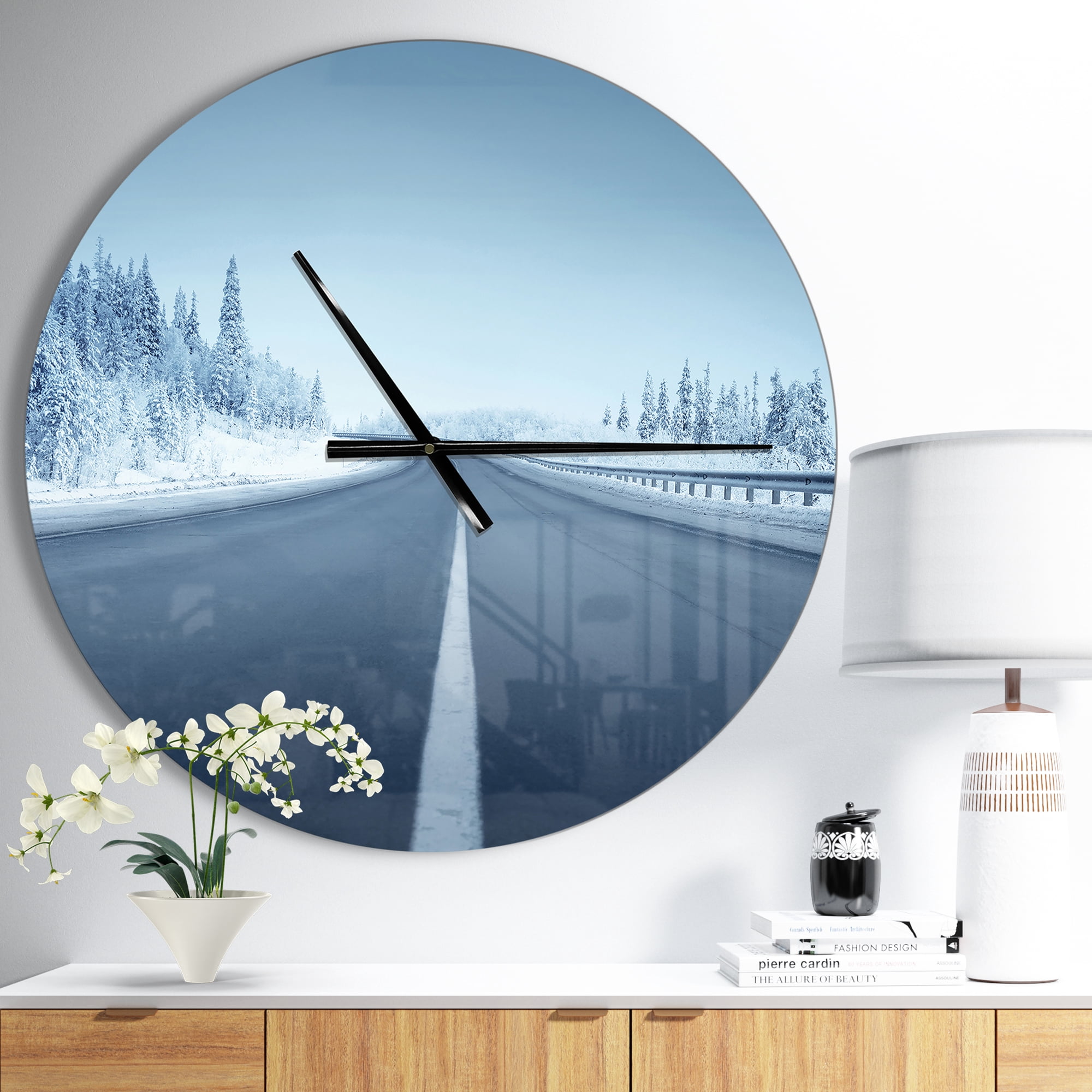 Designart 'Road in winter forest ' Modern wall clock