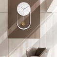 thumbnail image 2 of Reloj de pared minimalista con péndulo que no hace tictac, funciona con pilas. blanco, 2 of 7