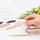 thumbnail image 5 of Kit de papelería de oficina oro rosa con 4 tipos de quitagrapas, abrecartas y grapadora. Accesorios de escritorio y suministros de oficina., 5 of 7
