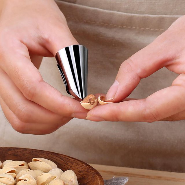 Protector de dedos Acero inoxidable Frijoles de frutas Pelador de ajos Utensilios de cocina