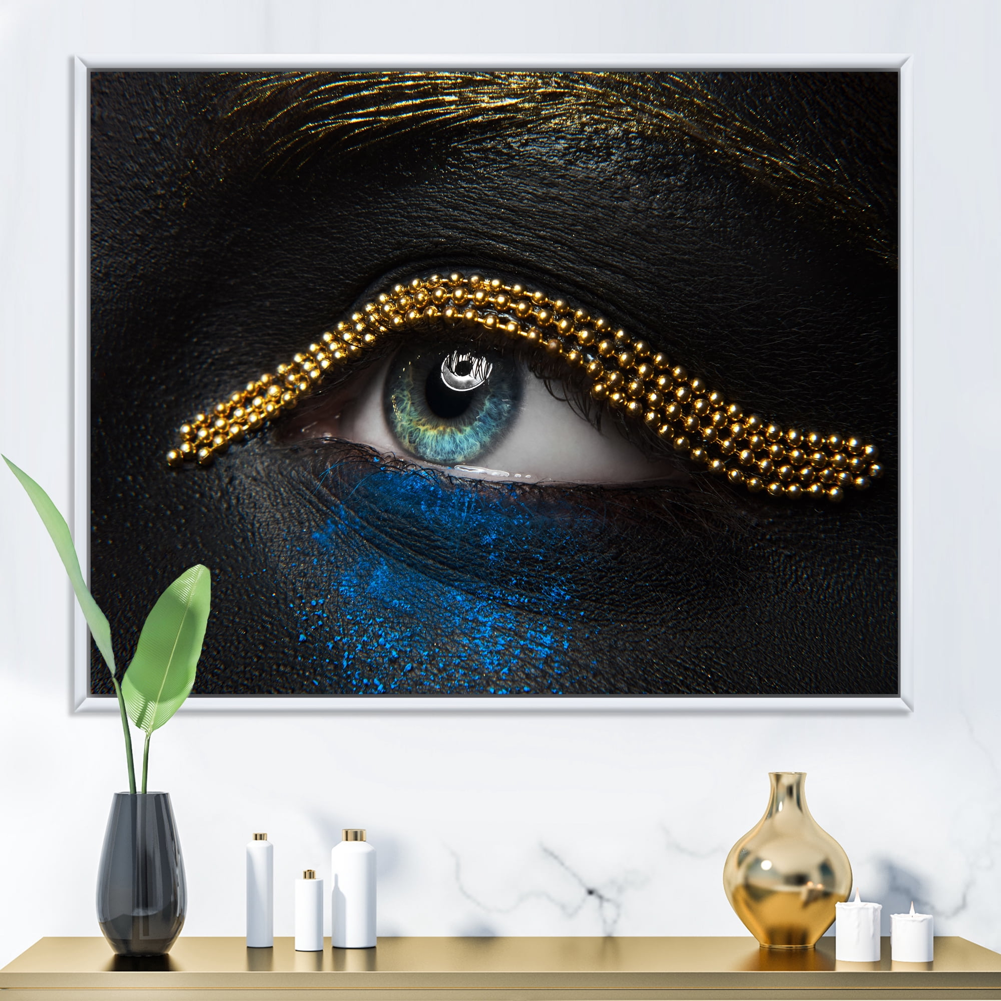 Woman Eyes With Black Skin With A Gold Chain 40 in x 30 in Framed Photography Canvas Art Print, by Designart