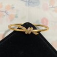 thumbnail image 1 of Tiffany & Co.18k Gold Knot Diamond Bracelet, 1 of 5