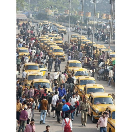 Yellow Kolkata Taxis and Commuters at Howrah Railway Station, Howrah, Kolkata (Calcutta), India Print Wall Art By Annie (Best Radio Stations In India)
