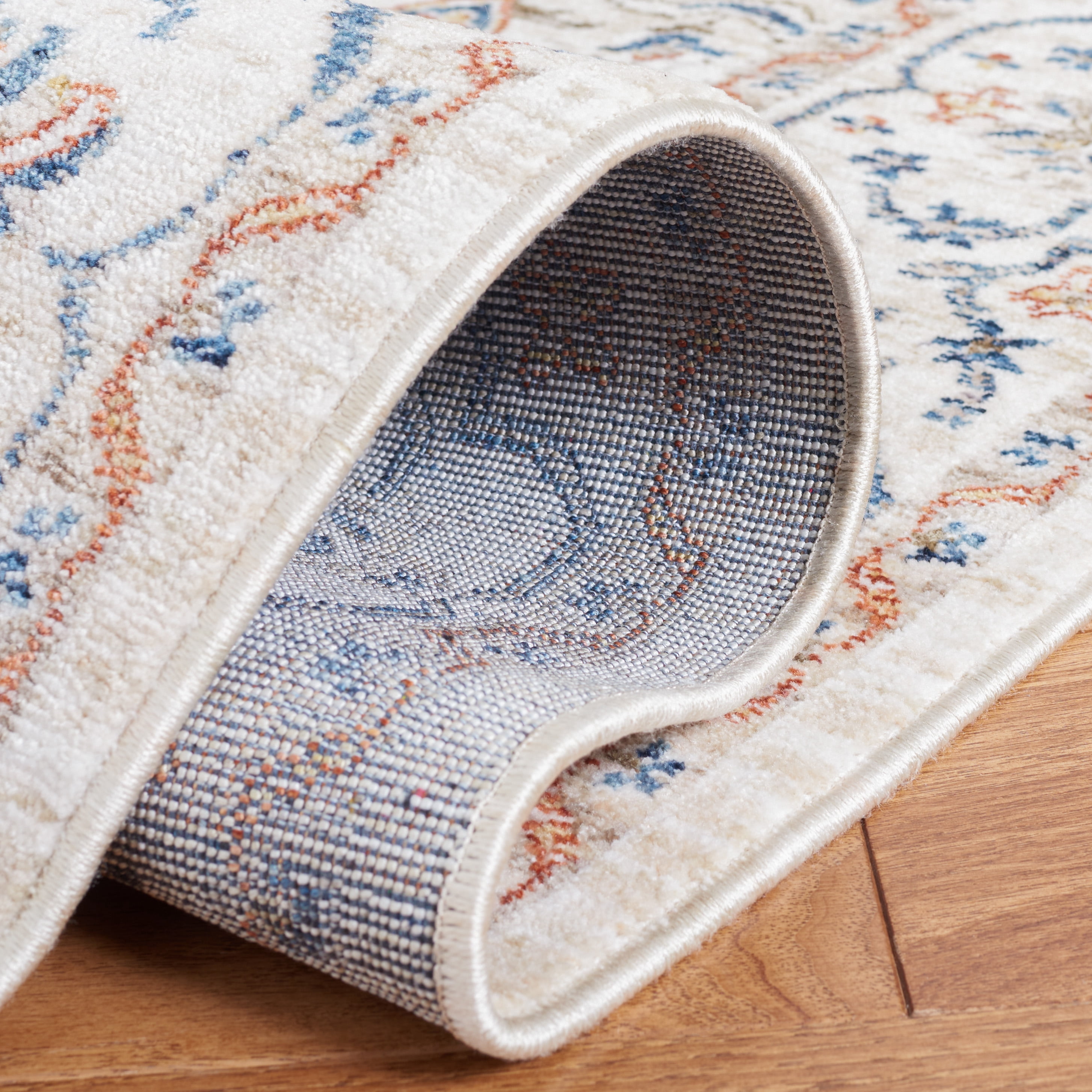 SAFAVIEH Olympia Collection OPA210A Ivory / Navy Rug