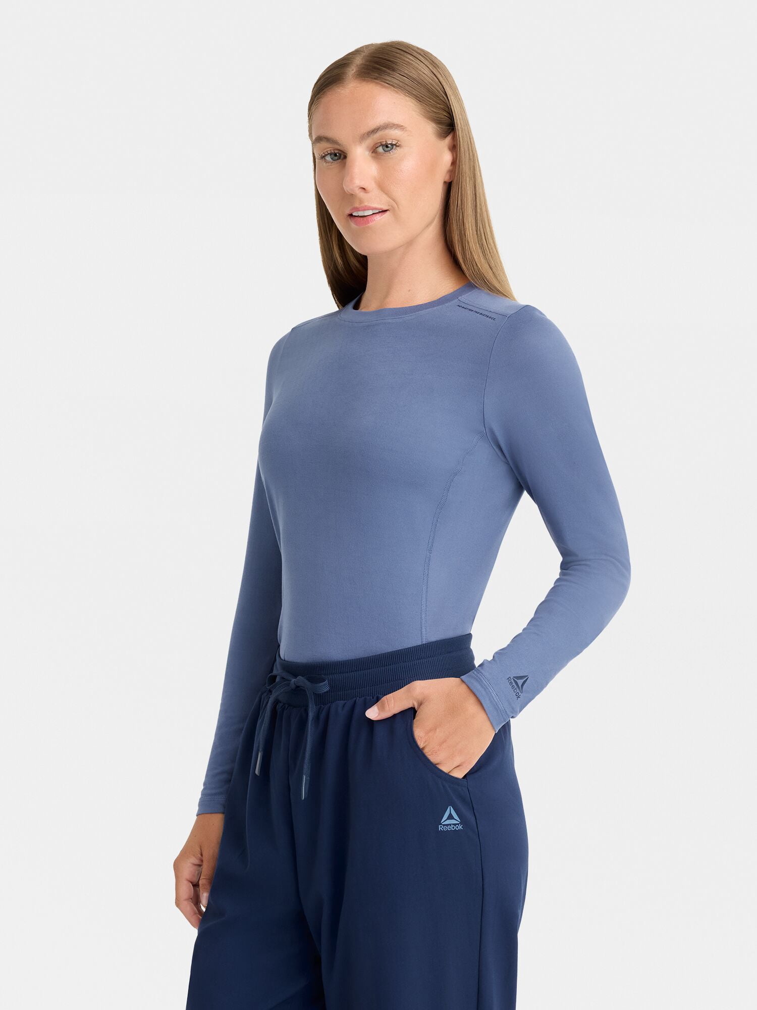 Reebok Women's Under Scrub Top with Moisture Wicking, 1 Pack Sizes S-3XL