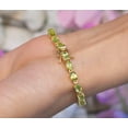 thumbnail image 2 of Bluebelljewels Oval Cut Peridot 14K Yellow Gold Finish Silver Tennis Bracelet, 2 of 4