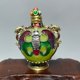 thumbnail image 3 of Antique-style snuff bottle, crafted from alloy and inlaid with moonstone, is a decorative item., 3 of 4