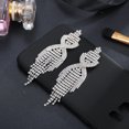 thumbnail image 2 of Pendientes largos con borlas incrustadas de diamantes de moda europea y americana, pendientes largos con borlas de diamantes con clip de cadena exagerado, pendientes de diamantes con destellos, 2 of 6
