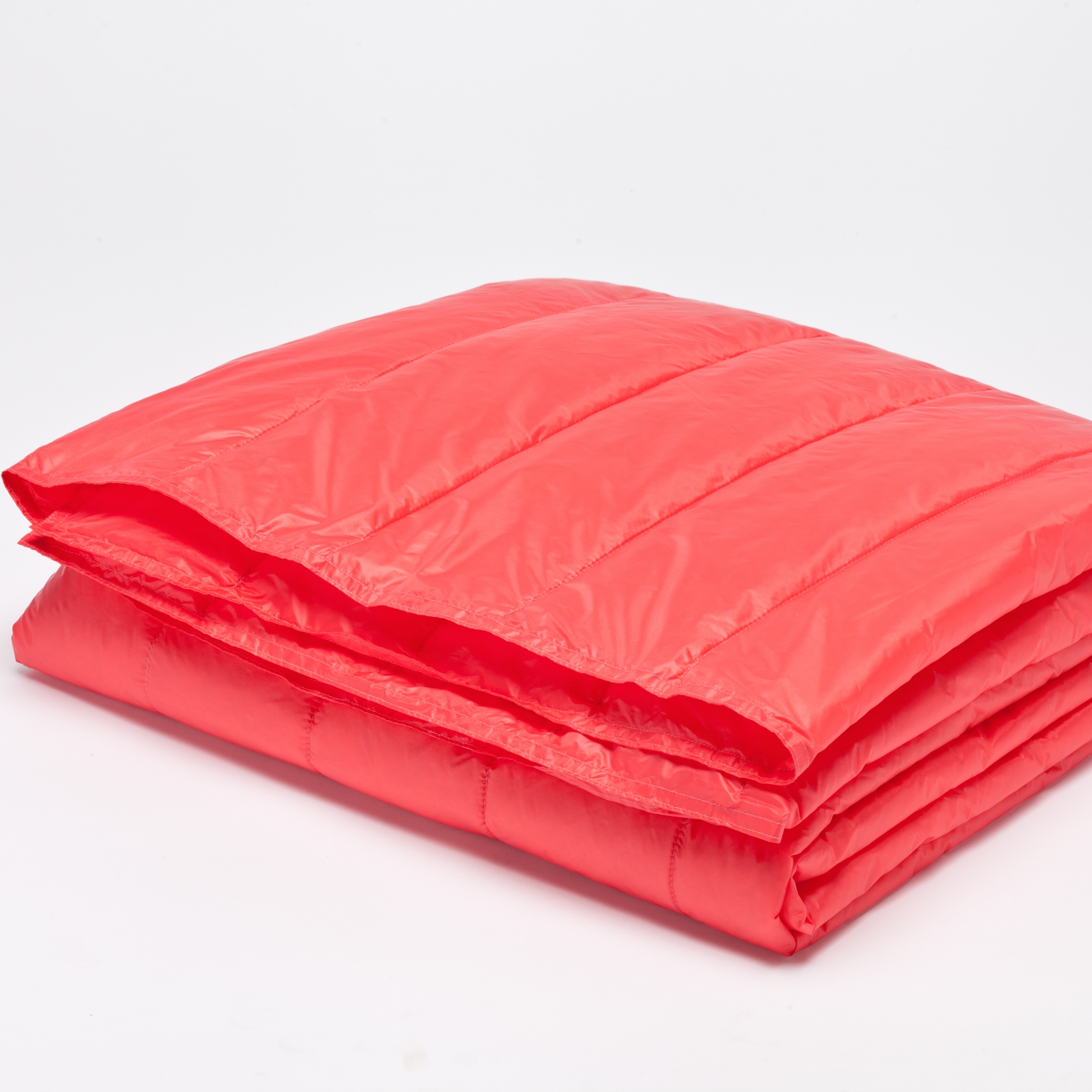 Photo 1 of PUFF 50 x 70 Packable Down Alternative Indoor/Outdoor Water Resistant Throw with Extra Strong Nylon Cover