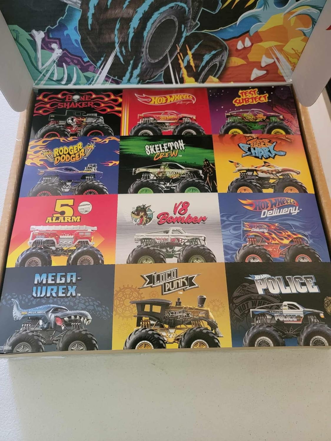 Hot Wheels Monster Trucks 1:64 Scale Die-Cast Ultimate Chaos 12 Pack Toy Vehicles for Kids Ages 3 years and older