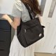 thumbnail image 2 of Bolso de lona Monstrate para mujer negro suave y cómodo con cremalleras para fitness y yoga, 2 of 6