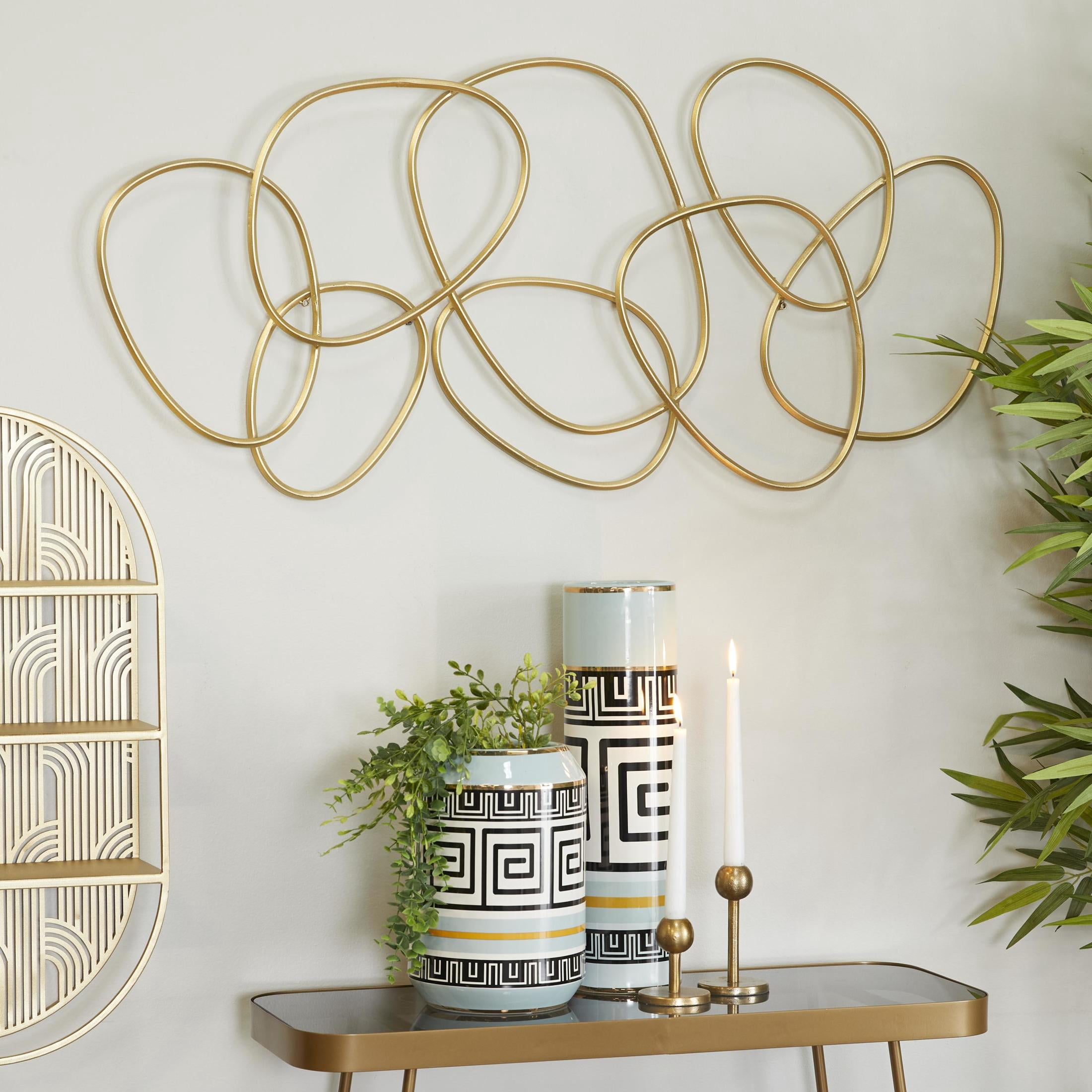 CosmoLiving by Cosmpolitan Contemporary Metal Round Abstract Design Wall Décor, 43"W x 22"H with Gold Polished Finish