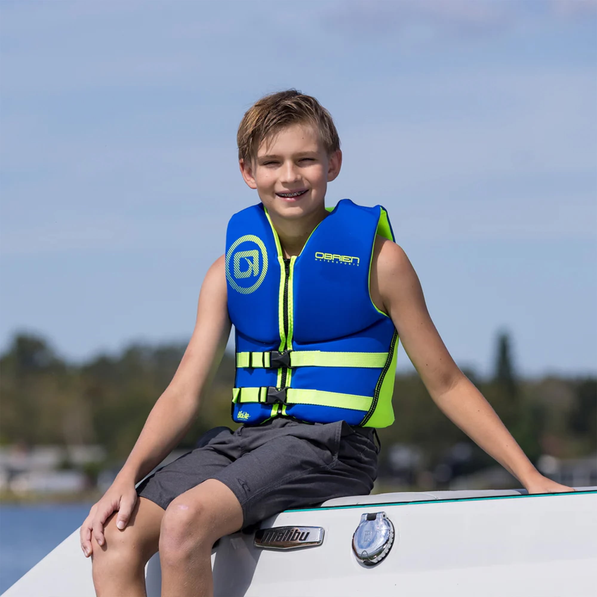 O'Brien Youth Traditional Neoprene CGA Life Jacket, Size 55 to 85 lb, Blue/Green