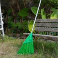 thumbnail image 2 of Green roadmender's broom Sweeping dead leaves from the garden, 2 of 4