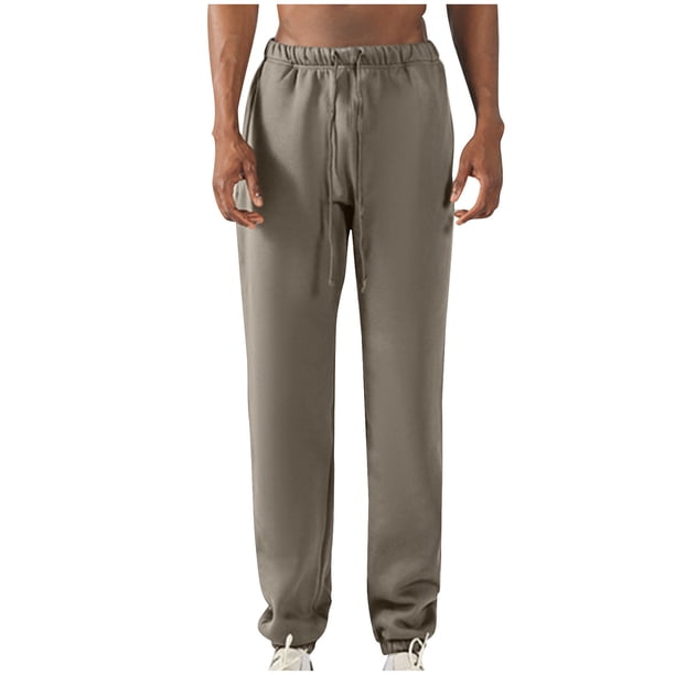 Pantalones largos para hombre, con cintura elástica, color liso, con cordón y bolsillos, de poliéster.