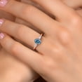 thumbnail image 4 of Gem Stone King 18K Rose Gold Plated Silver Persian Blue Moissanite and Lab Grown Diamond Engagement Ring for Women | 1.68 Cttw | Oval 8X6MM | Gemstone Birthstone | Size 8, 4 of 6