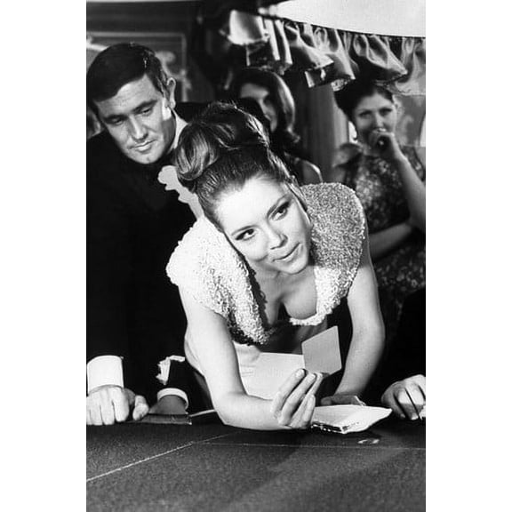 Diana Rigg huge cleavage leans forward over gaming table 24x36 Poster