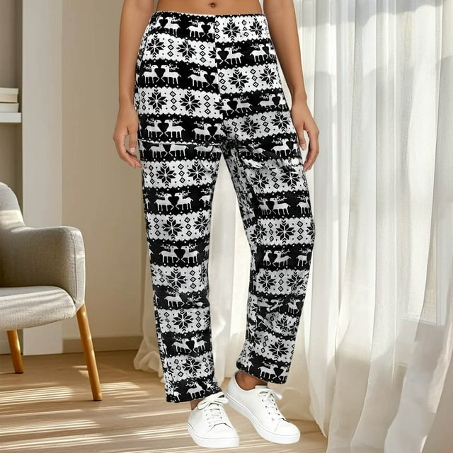 Pantalones de dormir de franela suave con cintura elástica para mujer, con estampado festivo y bolsillos laterales. Pantalones de poliéster para mujer.