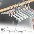 thumbnail image 1 of Perchas plegables de viaje Pack de 5 | Portaobjetos telescópicos antideslizantes de plástico ligero con clips para prendas de bebé y de adulto compacto | Organizador de secado portátil, duradero y, 1 of 6