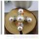 thumbnail image 4 of Moluckfu Decorativo Con De Cruz Y Para Looks Sofisticados Y Elegantes, 4 of 8