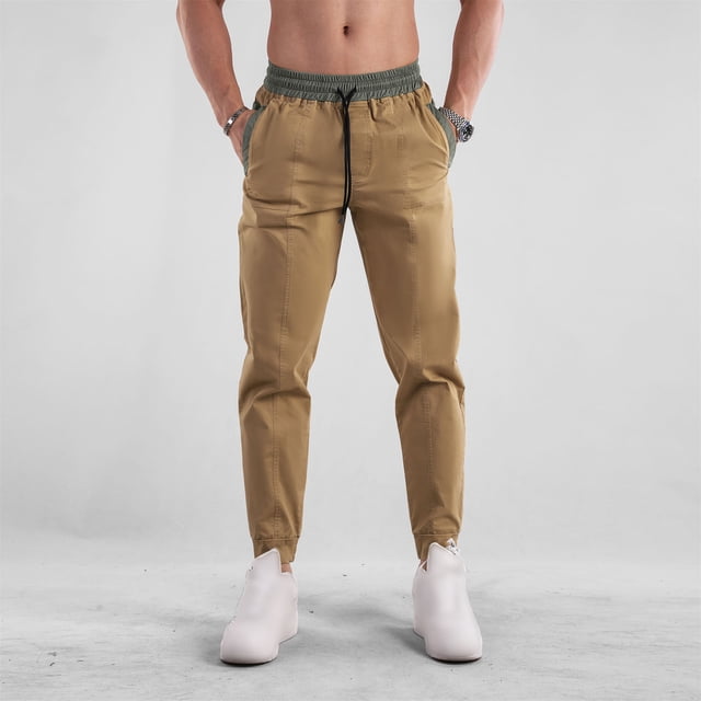 Pantalones largos para hombre, lisos, a la moda, informales, deportivos, con cordón ajustable, bolsillos en las piernas, monos para hombre, pantalones de caballería de algodón y seda fresca.