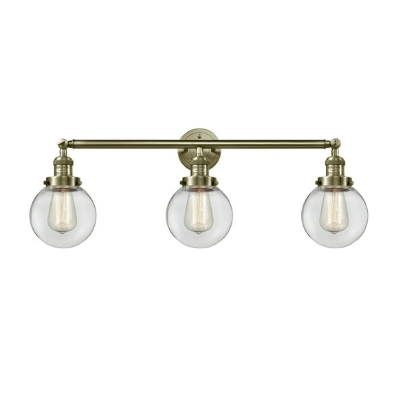 Innovations Lighting Beacon 3 Light 30" Bath Vanity Light Antique Brass/Clear