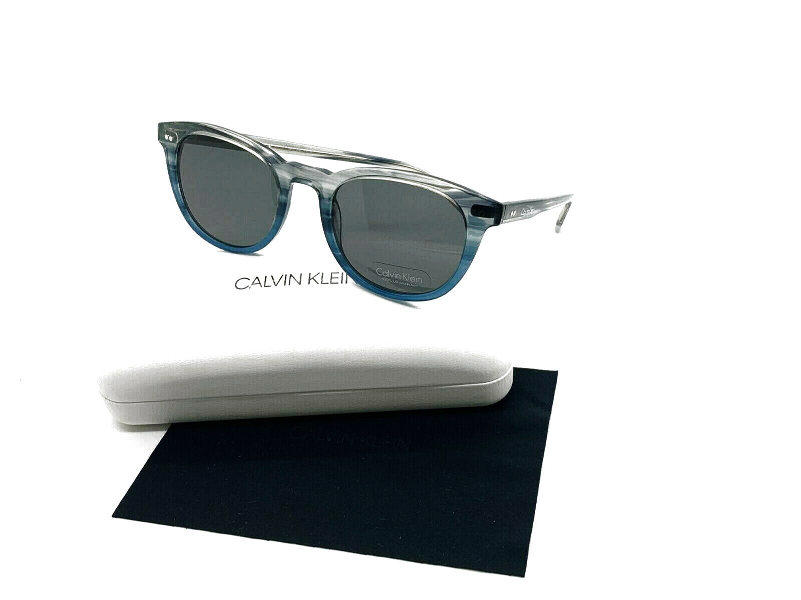 Sunglasses CK 4358 S 064 STRIPED GREY/BLUE