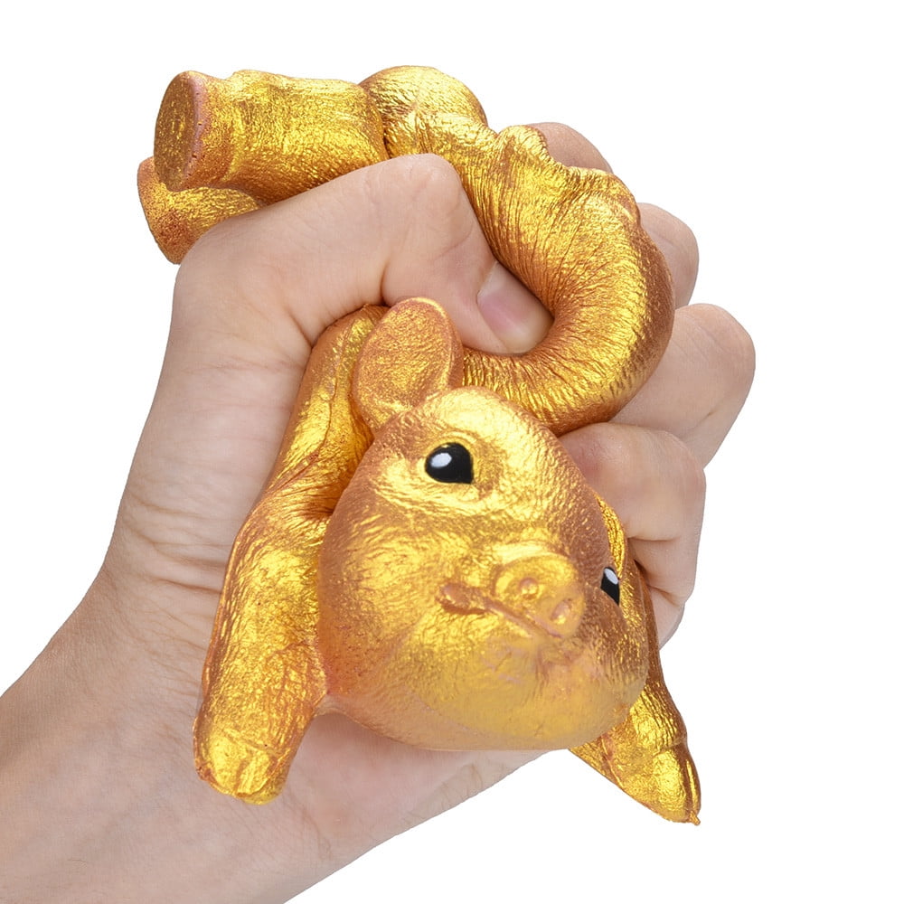 gold squishy pig