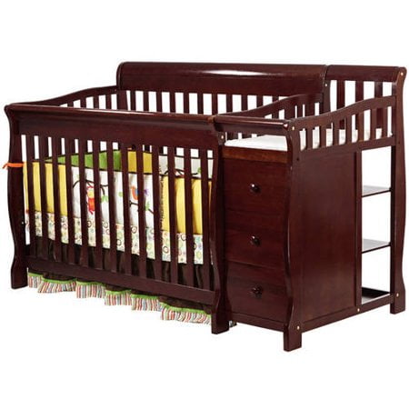 It includes a 1 waterproof changer pad, safety strap, two shelves, and a drawer for added storage. dream on me brody 5 in 1 convertible crib with changer cherry