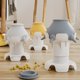 thumbnail image 5 of Comedero de leche para mascotas Yuxing con 4 tetinas de silicona suave base elevada color amarillo, 5 of 5