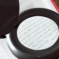 thumbnail image 3 of OttLite Space Saving Magnifier LED Desk Lamp, Optical Grade Magnification, Adjustable Arm, Pivoting Head, Portable to Travel, for Crafting & Needlework, Magnifying Glass with Light and Stand, Black, 3 of 5