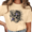 2-Beige, variant on Giffimy Women Floral Skull With Purple Rose Wild Fern Botanical Gothic Crew Neck Short Sleeve S-3XL Apricot Tops