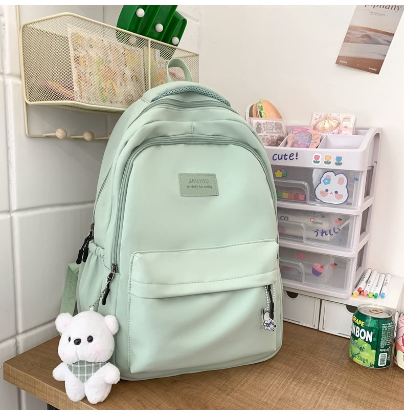 Student Japanese large-capacity backpack Teenagers simple and versatile backpack Unisex polyester material Doll decoration