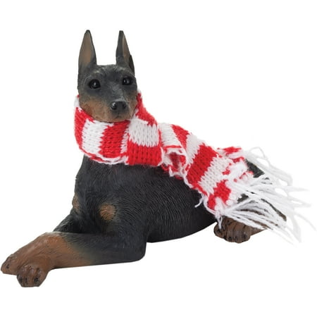 sandicast lying black doberman