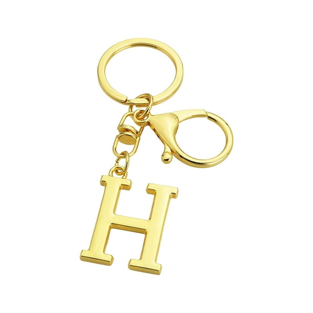 1 llavero de metal con letras doradas de la A a la Z, colgante con la primera letra y bolsa, regalo de Navidad.