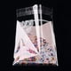 thumbnail image 2 of Bolsas rosas genéricas para dulces, rectangulares, de celofán OPP, 13,6 x 9,7 cm, 95-100 unidades, ideales para celebraciones y aniversarios., 2 of 3