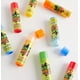 thumbnail image 2 of Bálsamo Labial Taste Beauty Naranja, Rojo, Frambuesa Azul, Limón y Lima Hidratante para Niños, 2 of 4