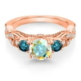 thumbnail image 2 of Gem Stone King 18K Rose Gold Plated Silver Mercury Mist Mystic Topaz Blue Diamond and White Moissanite Engagement Ring for Women (1.47 Cttw, Gemstone, Round 6MM and 3MM, Size 7), 2 of 4