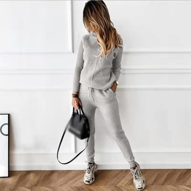 Conjunto de suéter y pantalones casuales de moda de color sólido con cuello alto para mujer